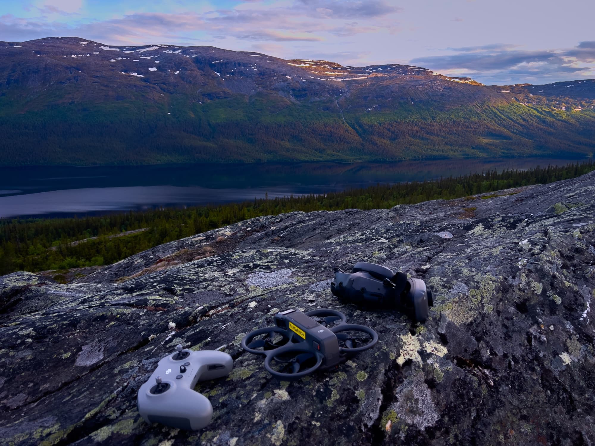 The DJI Avata and FPV kit, ready on the rock above the valley.